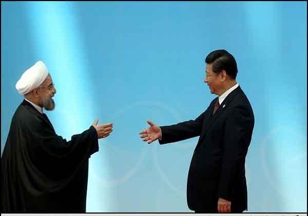 Irans Präsident Hassan Rouhani (l) und sein chinesischer Amtskollege Xi Jinping
