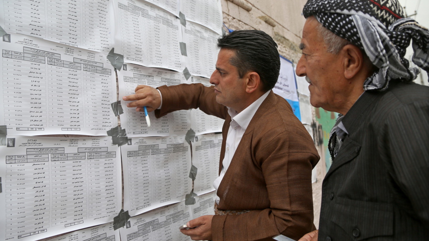 Kurden am Samstag in einem Wahllokal in Erbil (Foto: Keystone/EPA/Gailan Haji)