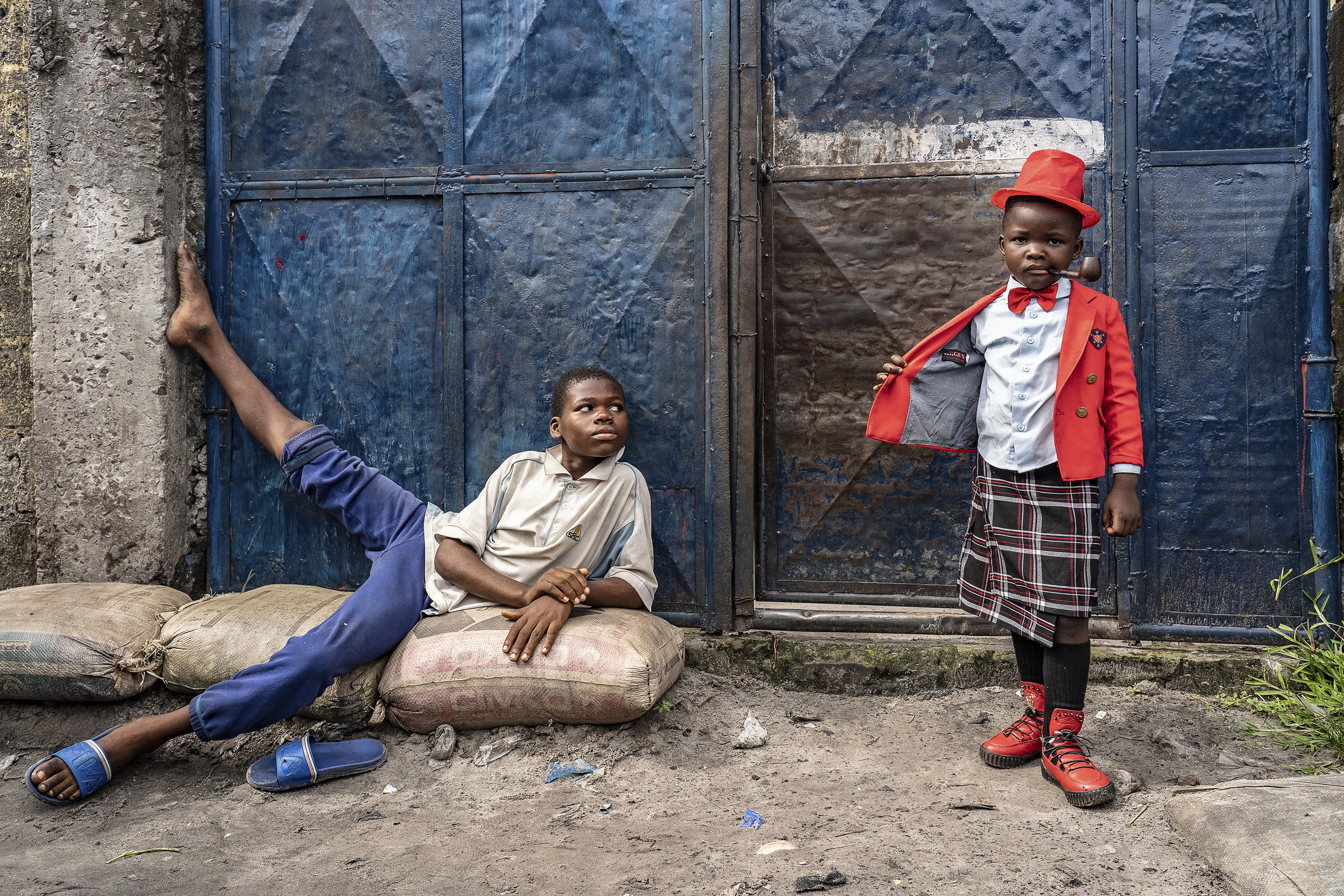 Israell Mbona, 5-year-old school student and sapeur for 3 years, in Kinshasa, 2019 © Tariq Zaidi