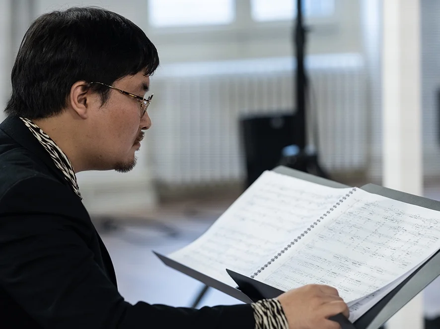 Shin Kim mit Partitur