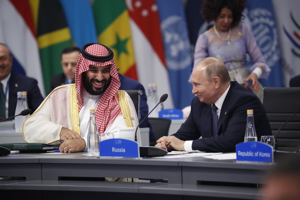audi Arabia Crown Prince Mohammed bin Salman talks with Russia President Vladimir Putin during a G20 session with other heads of state, Friday, Nov. 30, 2018 in Buenos Aires, Argentina. (AP Photo/Pablo Martinez Monsivais)