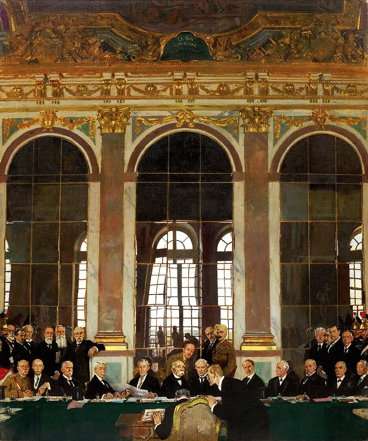 Im Spiegelsaal von Versailles unterschreibt Deutschland unter Druck und unter Protesten den Friedensvertrag von Versailles. Im Bild vorne: Der Deutsche Johannes Bell (Deutschland) unterzeichnend mit Hermann Müller (über ihn gebeugt) den Vertrag. In der Mitte (mit Schnauz) Georges Clemenceau (Frankreich), links von ihm der amerikanische Präsident Woodrow Wilson. Rechts von Clemenceau Lloyd Geroge. – Der Vertrag war am 18. Januar 1919 auf der Pariser Friedenskonferenz im Schloss Versailles geschlossen worden.