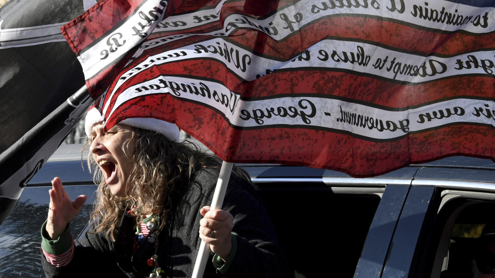Auch schreien nützt nichts mehr: Eine Trump-Anhängerin am Neujahrstag während einer „Trump-Parade“ in Pasadena. (Foto: Keystone/Keith Birmingham/The Orange County Register via AP)          